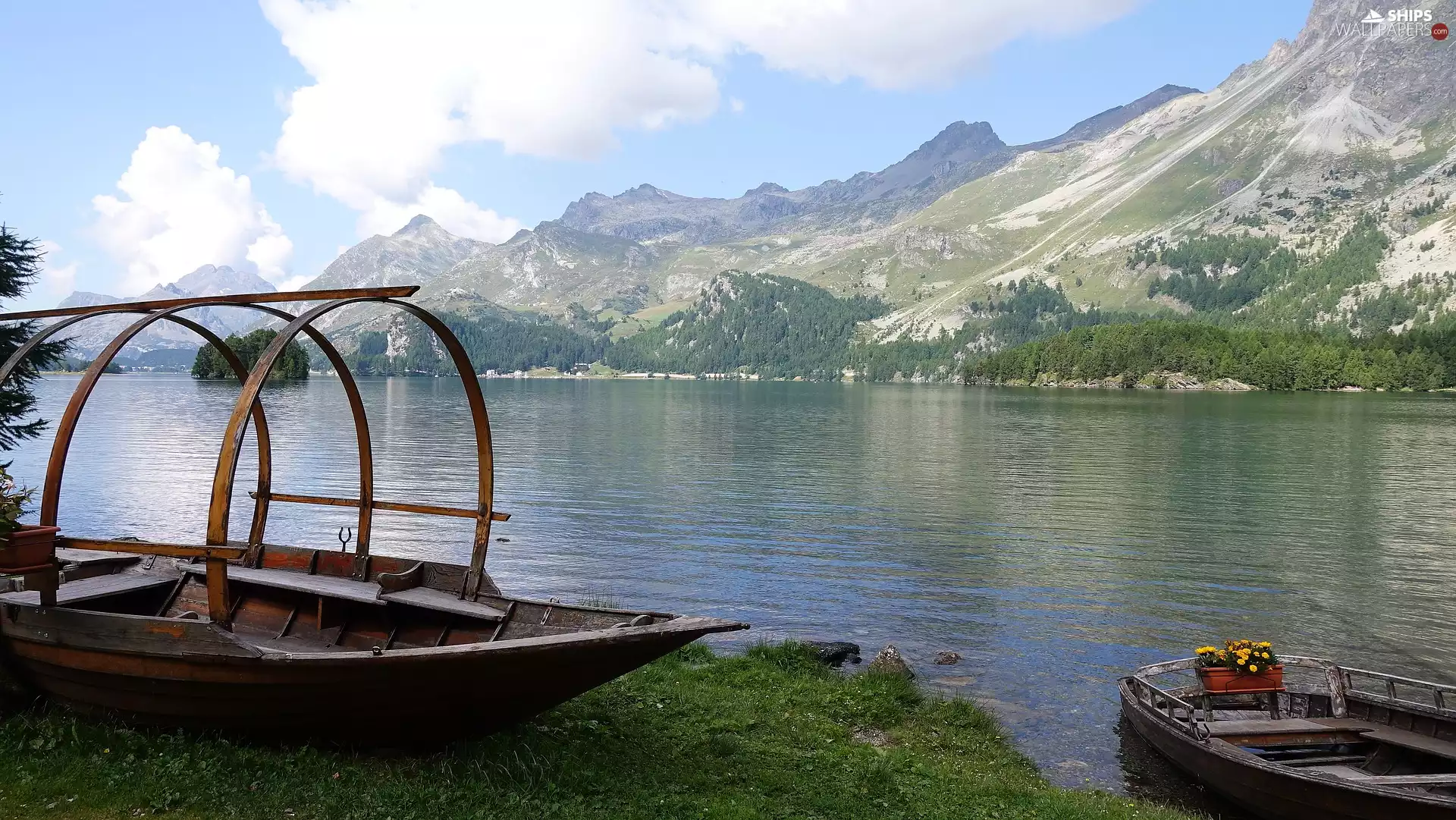 Mountains, boats, lake